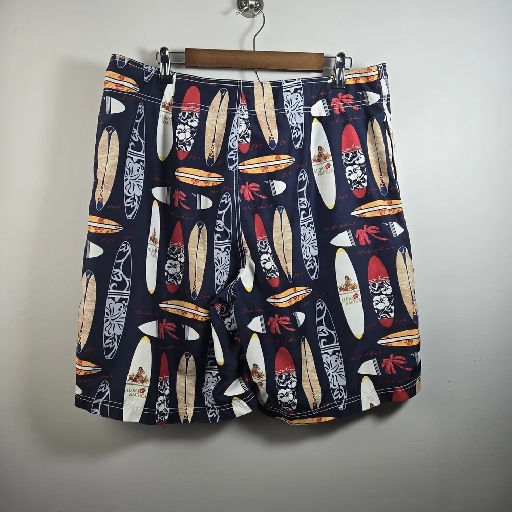 Nautica Blue and Red Swim Trunks with Surfboard Design